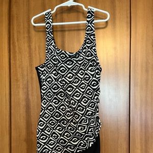 Amoeba style women’s one piece swimsuit. Hides the tummy…size 10